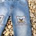 Calça Infantil Jeans com Bordado de Ursinho Momi