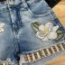 Conjunto Infantil Blusa e Shorts Jeans Bordado com Pedrarias Infinity Flowers Kukixo