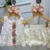 Conjunto Infantil Feminino Roana Off-White Bata com Bordados Floral e Shorts com Laço