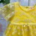 Vestido Infantil Momi Amarelo de Tule com Brilho e Estampa de Margaridas